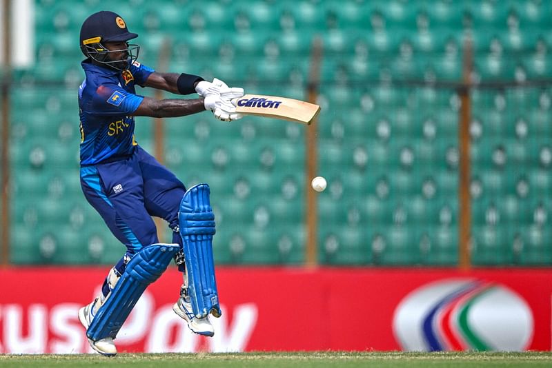 Sri Lanka's Janith Liyanage plays a shot during the third and last one-day international (ODI) cricket match between Bangladesh and Sri Lanka at the Zahur Ahmed Chowdhury Stadium in Chittagong on 18 March 2024.