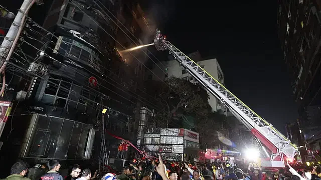 Fire service extinguishing fire at the multi-storey building. Photo taken Thursday night