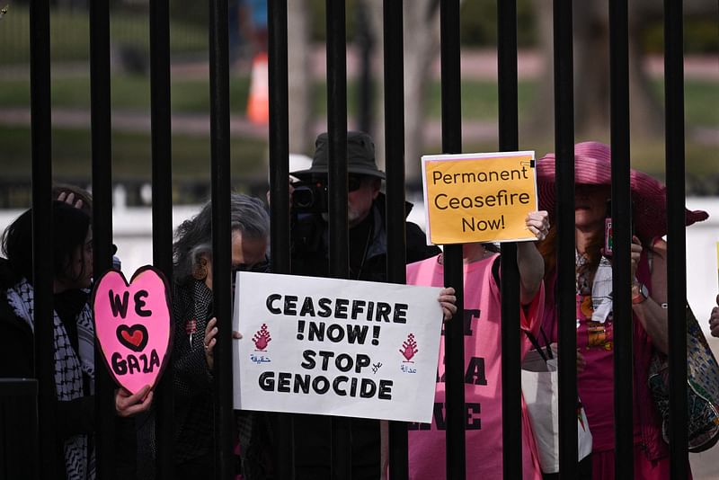 Protestors outside of the White House gates call for a ceasfire in Gaza on March 4, 2024 in Washington, DC. US Vice President Kamala Harris is meeting with Benny Gantz- an Israeli war cabinet member and key rival of Prime Minister Benjamin Netanyahu -- in a sign of growing White House frustration with Israel's offensive in Gaza