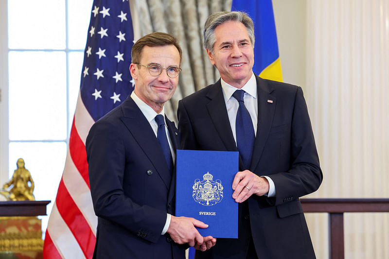 US secretary of state Antony Blinken accepts Sweden's instruments of accession from Swedish Prime Minister Ulf Kristersson for its entry into NATO at the State Department in Washington, US, 7 March, 2024.