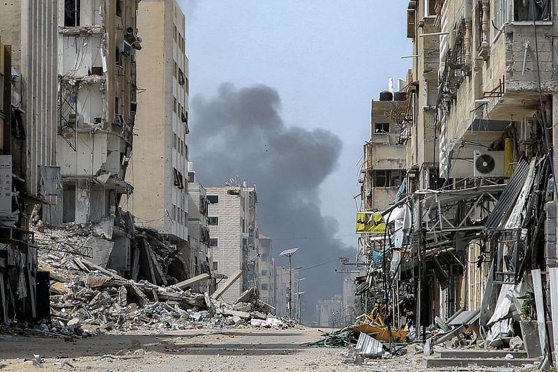 Smoke rises during an Israeli strike in the vicinity of the al-Shifa hospital in Gaza City on 28 March, 2024, amid the ongoing conflict between Israel and the Palestinian Hamas group