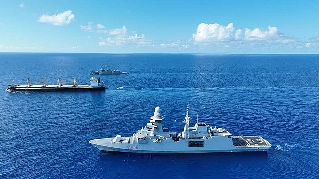 A picture showing two warships of EU Naval Force escorting Bangladeshi vessel MV Abdullah