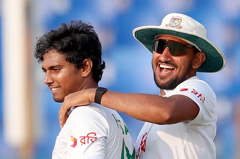 Bangladesh pacers Hasan Mahmud (L) and Khaled Ahmed celebrate a wicket against Sri Lanka on the 3rd Day of Chattogram Test on 1 April, 2024