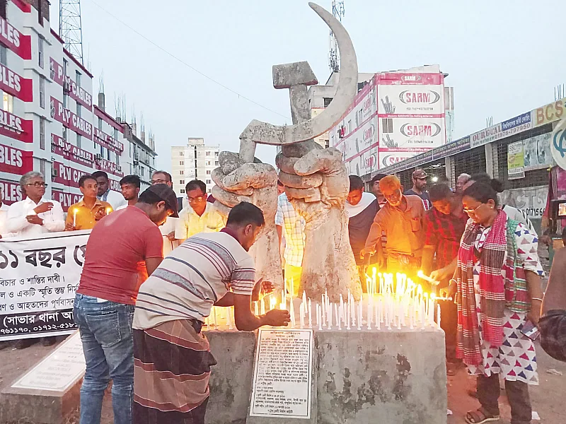 People lit candle in memory of the victim of the Rana Plaza building collapsed in Savar, outskirts of the capital Dhaka, on 24 April 2024. The multi-storied Rana Plaza that housed several clothing factories collapsed on 24 April 2013, killing 1,135 people and leaving 1,169 others maimed.