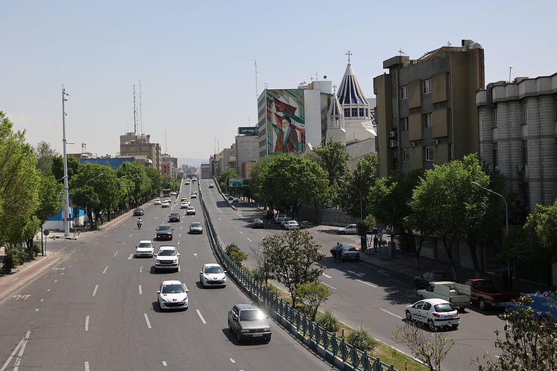 Cars pass on a street in Tehran, Iran on 19 April, 2024