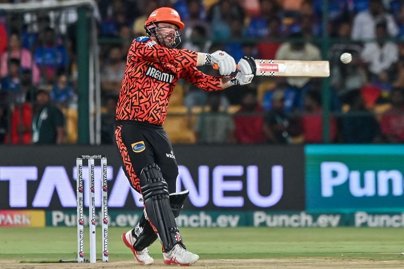 Sunrisers Hyderabad's Travis Head plays a shot during the Indian Premier League (IPL) Twenty20 cricket match between Royal Challengers Bengaluru and Sunrisers Hyderabad at the M Chinnaswamy Stadium in Bengaluru on April 15, 2024