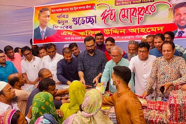 BNP senior joint secretary general Ruhul Kabir Rizvi is speaking at an event organised to distribute Eid gifts among the low income people at Uttara in the capital on Sunday.