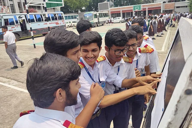 Students see their SSC results at RAJUK Uttara Model College on 12 May, 2024