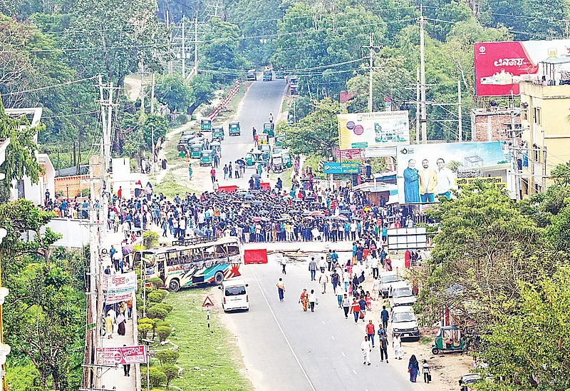 CUET students blocks the road in front of their campus in protest of two CUET students dying in road accidents in April 2024.