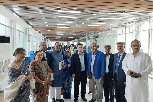 A nine-member team of the Awami League-led 14 Party alliance reaches Kunming, China on 13 May.