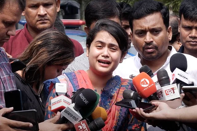 Mumtarin Ferdous, the daughter of the slain parliamentarian Anwarul Azim, speaks to the media before the DB office in Dhaka on 22 May, 2024.