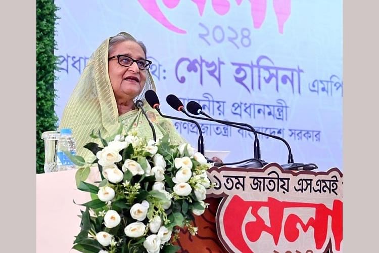 Prime Minister Sheikh Hasina addresses the opening ceremony of the 7-day 11th National Small and Medium Enterprises Fair at the Bangabandhu International Conference Centre at Agargaon, Dhaka on 19 May, 2024