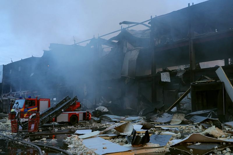 Ukrainian firefighters put out a fire in food warehouse after Russian missile strike to Odesa on 17 May 2024, amid the Russian invasion in Ukraine.