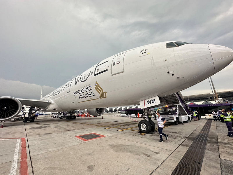 A Singapore airline aircraft is seen on tarmac after requesting an emergency landing at Bangkok's Suvarnabhumi International Airport, Thailand, 21 May 2024.