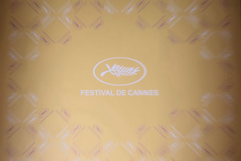 A photo shows the festival logo ahead a press conference to announce the official selection of the 77th edition of the Cannes Film Festival, at the UGC Normandie cinema in Paris, on 13 April, 2024. Artificial intelligence, QRCode, call buttons: the security of the 77th Cannes Film Festival will be imbued with technology with experimental devices at a time when the vigipirate plan is at its maximum level, less than three months before the Olympic Games.