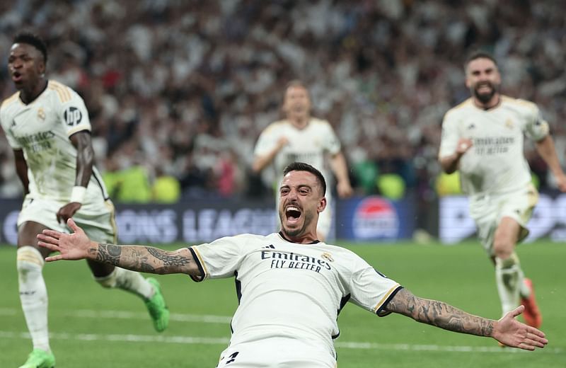 Real Madrid’s Spanish forward #14 Joselu celebrates scoring during the UEFA Champions League semi-final second leg football match between Real Madrid CF and FC Bayern Munich at the Santiago Bernabeu stadium in Madrid on 8 May, 2024