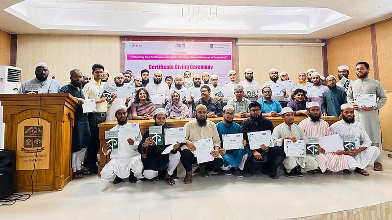 The participants pose for a photograph after the training sessions