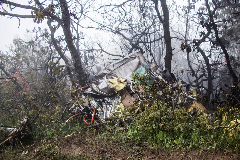 A view of the wreckage of Iranian president Ebrahim Raisi's helicopter at the crash site on a mountain in Varzaghan area, northwestern Iran, 20 May, 2024.