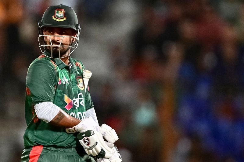 Litton Das walks back to the pavilion after his dismissal during the first Twenty20 international cricket match between Bangladesh and Zimbabwe on 3 May, 2024.