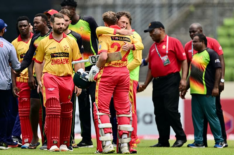 Zimbabwe’s players celebrate after winning the fifth Twenty20 international cricket match between Bangladesh and Zimbabwe at the Sher-E-Bangla National Cricket Stadium in Dhaka on 12 May 2024.