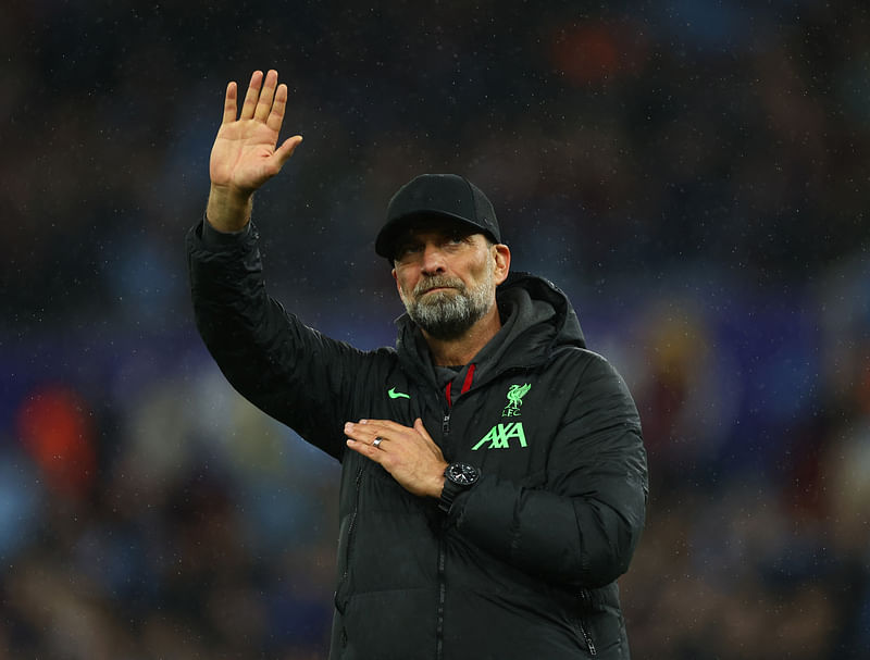 Liverpool manager Juergen Klopp acknowledges the fans after the match against Aston Villa