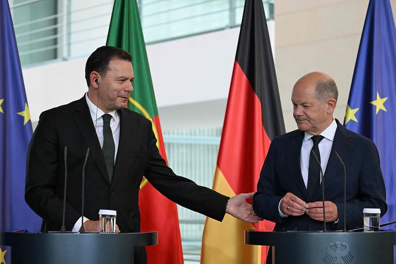 German Chancellor Olaf Scholz (R) and Portuguese Prime Minister Luis Montenegro address a joint press conference after talks at the Chancellery in Berlin, Germany on 24 May, 2024