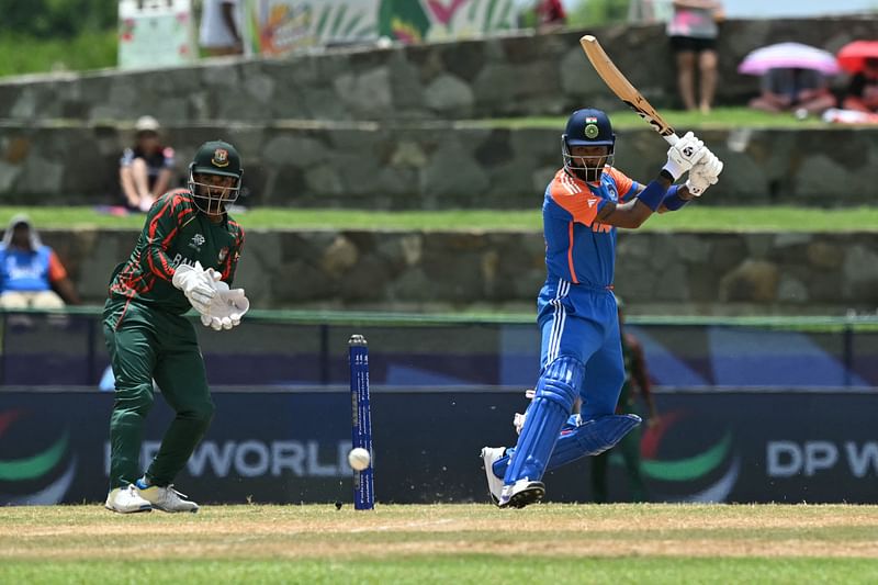 India's Hardik Pandya plays a shot during the ICC men's Twenty20 World Cup 2024 Super Eight cricket match between India and Bangladesh at Sir Vivian Richards Stadium in North Sound, Antigua and Barbuda, on 22 June 2024.