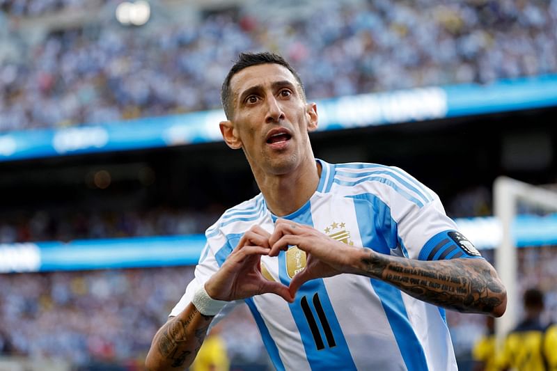 Argentina's forward #11 Angel Di Maria celebrates scoring his team's first goal during an international friendly football match between Argentina and Ecuador at Solider Field in Chicago, Illinois, on June 9, 2024