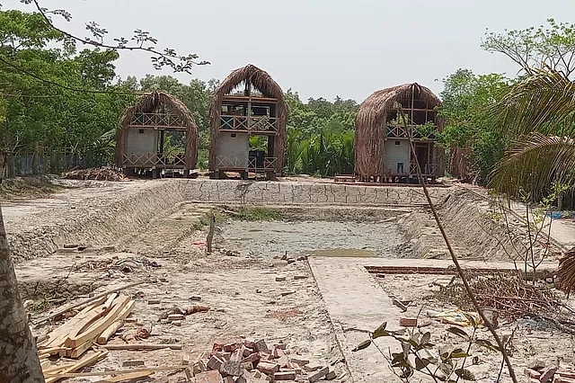 A resort is being built on a landfill on the banks of the river and a concrete road is also being constructed. The picture was taken from West Dhangmari village adjacent to the Sundarbans on 1 May.