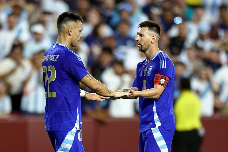 Lautaro Martínez #22 and Lionel Messi #10 of Argentina react during the first half against Guatemala at Commanders Field on 14 June 2024 in Landover, Maryland,  United States.