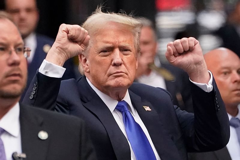 Former US President and Republican presidential candidate Donald Trump gestures as he arrives back at Trump Tower after being convicted in his criminal trial in New York City, on 30 May, 2024