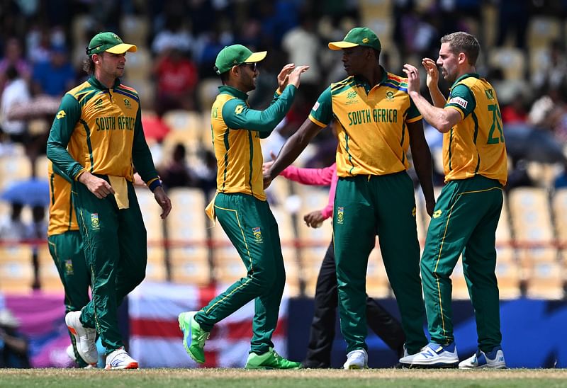 South Africa celebrates after winning the ICC men's Twenty20 World Cup 2024 Super Eight cricket match between England and South Africa at Daren Sammy National Cricket Stadium in Gros Islet, Saint Lucia, on 21 June, 2024