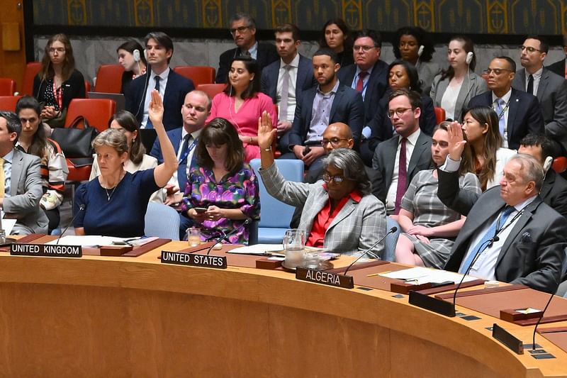 US Ambassador to the United Nations Linda Thomas-Greenfield (C) votes during a UN Security Council meeting on the situation in the Middle East at UN headquarters on 10 June 2024 in New York.