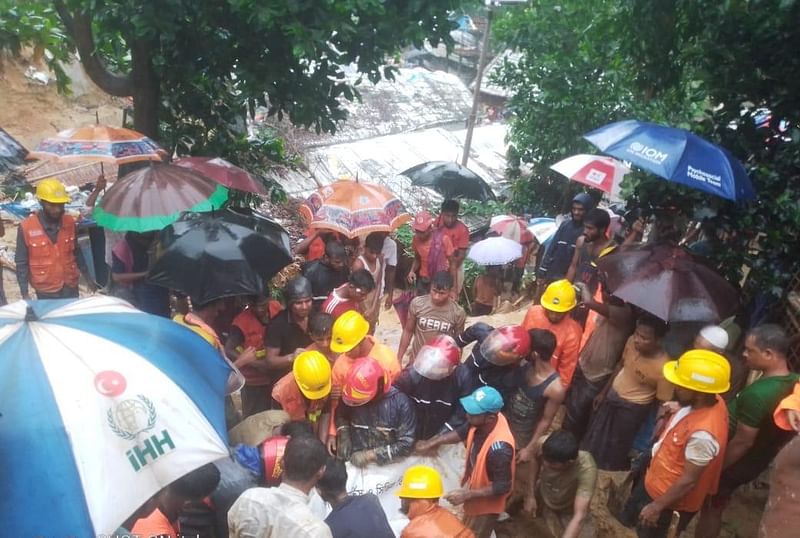 Rescuers are in action after nine people die in landslides in separate Rohingya camps in Cox’s Bazar’s Ukhiya upazila on 19 June 2024 amid heavy showers.