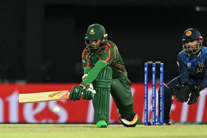 Bangladesh's Shakib Al Hasan sweeps the ball during the ICC men's Twenty20 World Cup 2024 group D cricket match between Sri Lanka and Bangladesh at the Grand Prairie Cricket Stadium in Grand Prairie, Texas, on June 7, 2024