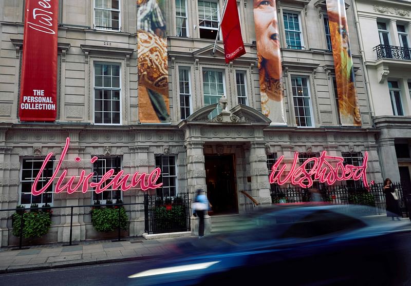 A car goes past Christie's auction house with its facade decorated for the 'Vivienne Westwood: The Personal Collection' auction in London on 13 June, 2024.