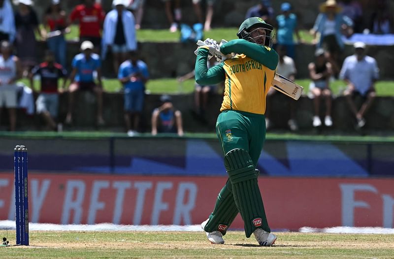 South Africa's Quinton de Kock hit a six during the ICC men's Twenty20 World Cup 2024 Super Eight cricket match between the United States and South Africa at Sir Vivian Richards Stadium in North Sound, Antigua and Barbuda on 19 June 2024.