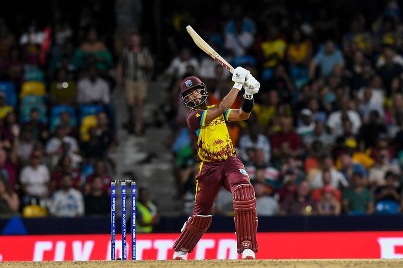 West Indies' Shai Hope hits a six leading to his team's victory in the ICC men's Twenty20 World Cup 2024 Super Eight cricket match between USA and West Indies at Kensington Oval in Bridgetown, Barbados on 24 June, 2024