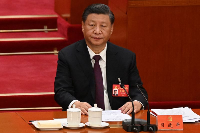 This file photo taken on 22 October 2022 shows China's President Xi Jinping attending the closing ceremony of the 20th Chinese Communist Party's Congress at the Great Hall of the People in Beijing. China will hold a key political meeting historically watched for signals on economic direction from July 15-18, state media reported on 27 June, 2024