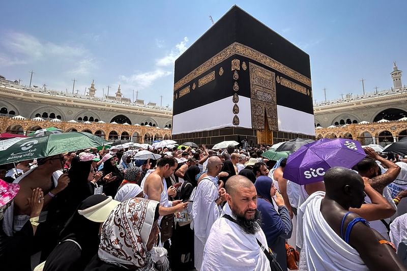 Muslim worshippers walk around the Kaaba, Islam’s holiest shrine, at the Grand Mosque in Saudi Arabia’s holy city of Mecca on 13 June, 2024, ahead of the annual Hajj pilgrimage