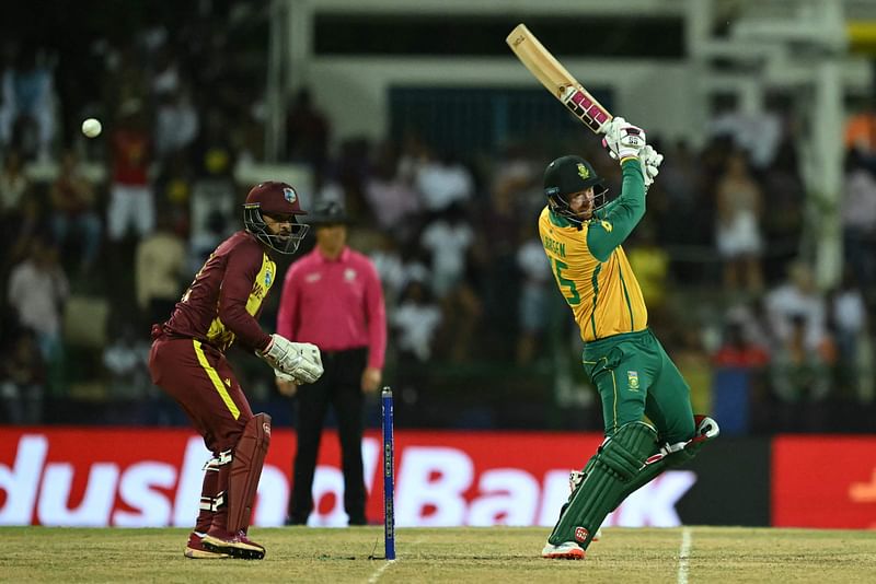 South Africa's Heinrich Klaasen hits a four during the Super Eight cricket match with West Indies at Sir Vivian Richards Stadium in North Sound, Antigua and Barbuda on 23 June, 2024.