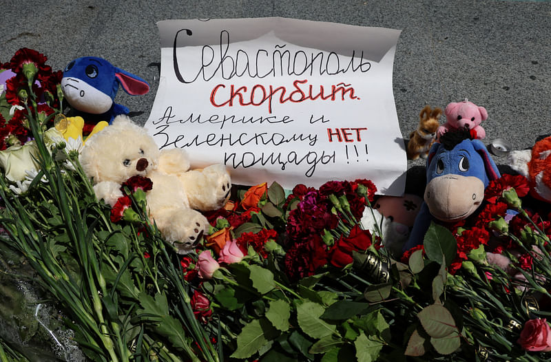 A view shows a makeshift memorial to victims of a shelling, which Russian authorities say was a Ukrainian missile strike in the course of Russia-Ukraine conflict, in Sevastopol, Crimea on 24 June, 2024