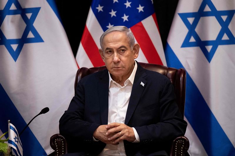 Israel's prime minister Benjamin Netanyahu waits for the start of the Israeli war cabinet meeting also attended by the US President, in Tel Aviv on 18 October, 2023, amid the ongoing battles between Israel and the Palestinian group Hamas.