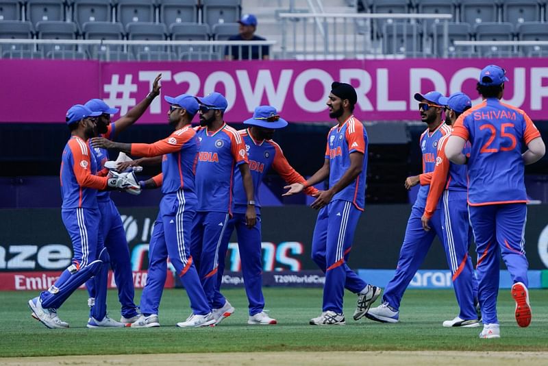 Members of India's team celebrate after taking the wicket of Ireland's captain Paul Stirling during the ICC men's Twenty20 World Cup 2024 group A cricket match between India and Ireland at Nassau County International Cricket Stadium in East Meadow, New York, on 5 June, 2024