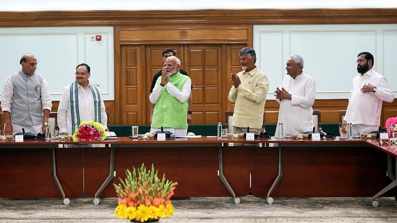 Prime Minister Narendra Modi with Bharatiya Janata Party (BJP) National President JP Nadda, Bihar Chief Minister Nitish Kumar, Telugu Desam Party (TDP) Chief N Chandrababu Naidu, Defence Minister Rajnath Singh and Maharashtra CM Eknath Shinde during the National Democratic Alliance (NDA) meeting, at his residence, 7, LKM, in New Delhi on 5 June, 2024