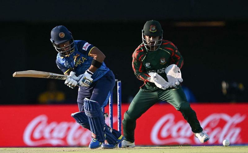 Sri Lanka's Kusal Mendis (L) plays a shot during the ICC men's Twenty20 World Cup 2024 group D cricket match between Sri Lanka and Bangladesh at the Grand Prairie Cricket Stadium in Grand Prairie, Texas, on 7 June 2024.