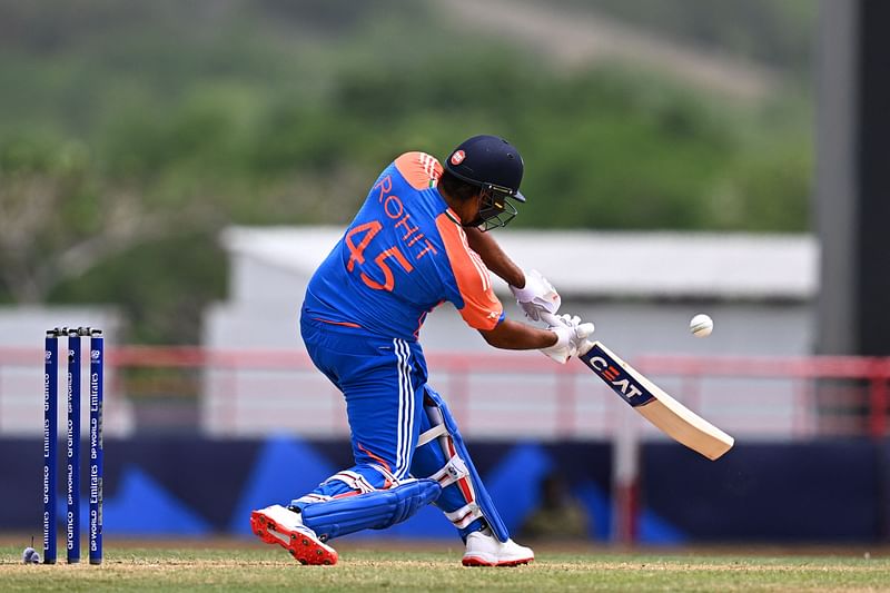 India’s captain Rohit Sharma hits a 6 during the ICC men’s Twenty20 World Cup 2024 Super Eight cricket match between Australia and India at Daren Sammy National Cricket Stadium in Gros Islet, Saint Lucia on 24 June, 2024