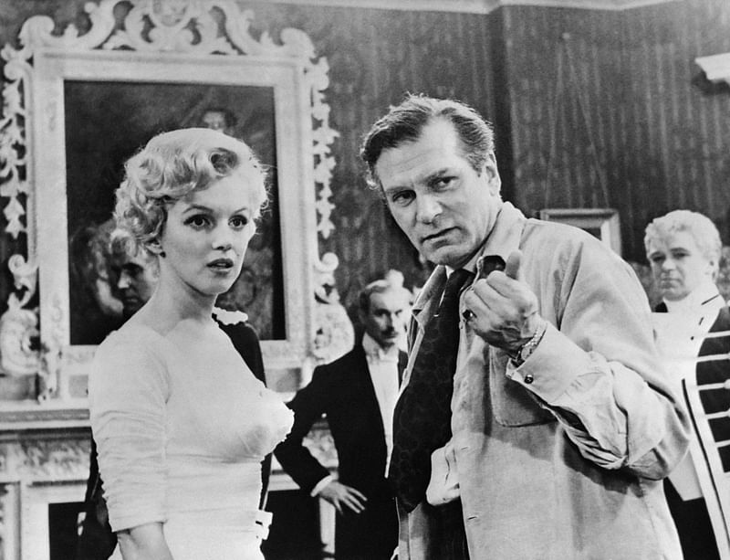 Film director Laurence Olivier directs US actress Marilyn Monroe on 14 August, 1956 during the filming of "The Prince and the Showgirl" at Pinewood's studios near London. The Los Angeles home where Marilyn Monroe died was declared a historic landmark on 26 June, 2024, thwarting plans by its current owners to demolish the property.