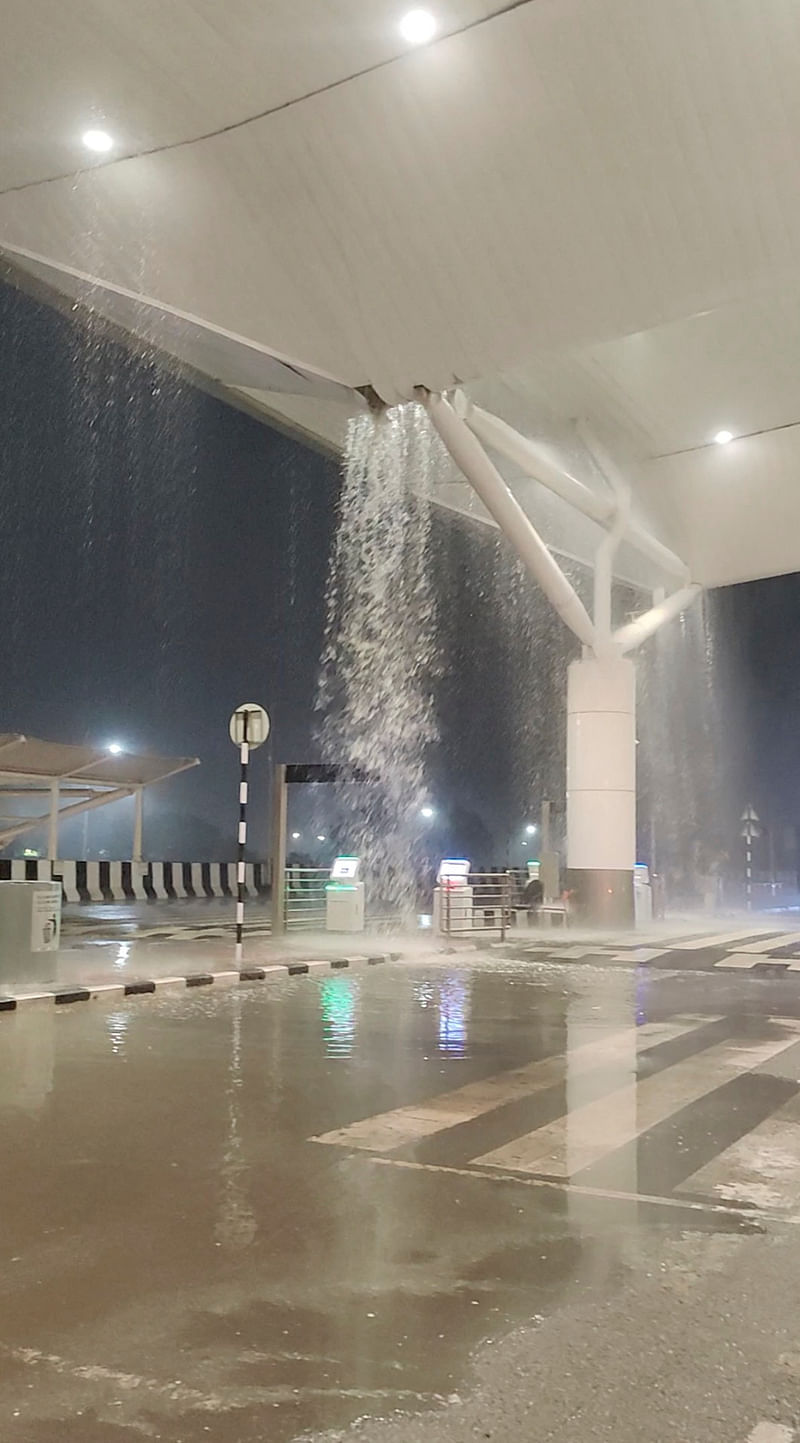 Water seeps through the roof amid heavy rain at Terminal 1 of the Indira Gandhi International Airport, New Delhi, India June 28, 2024 in this screen grab obtained from a social media video.