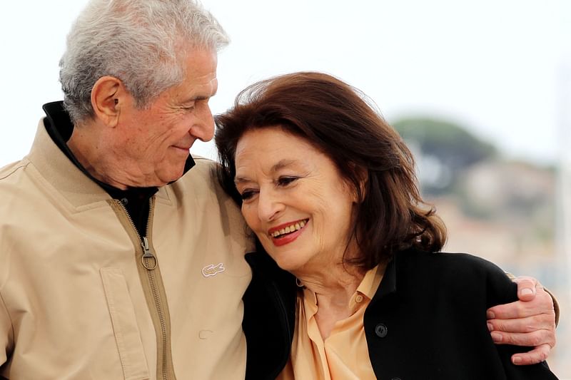 French director Claude Lelouch (L) and French actress Anouk Aimee pose during a photocall for the film 'The Best Years of a Life (Les Plus Belles Annees D'Une Vie)' at the 72nd edition of the Cannes Film Festival in Cannes, southern France, on 19 May, 2019.